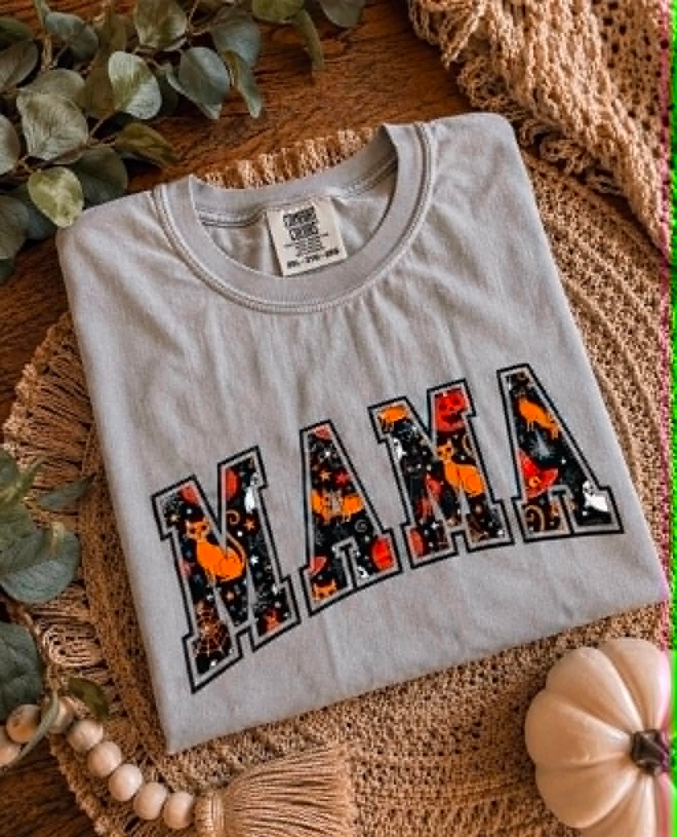 Grey Comfort Colors tee with an applique-style Mama design filled with a Halloween pattern