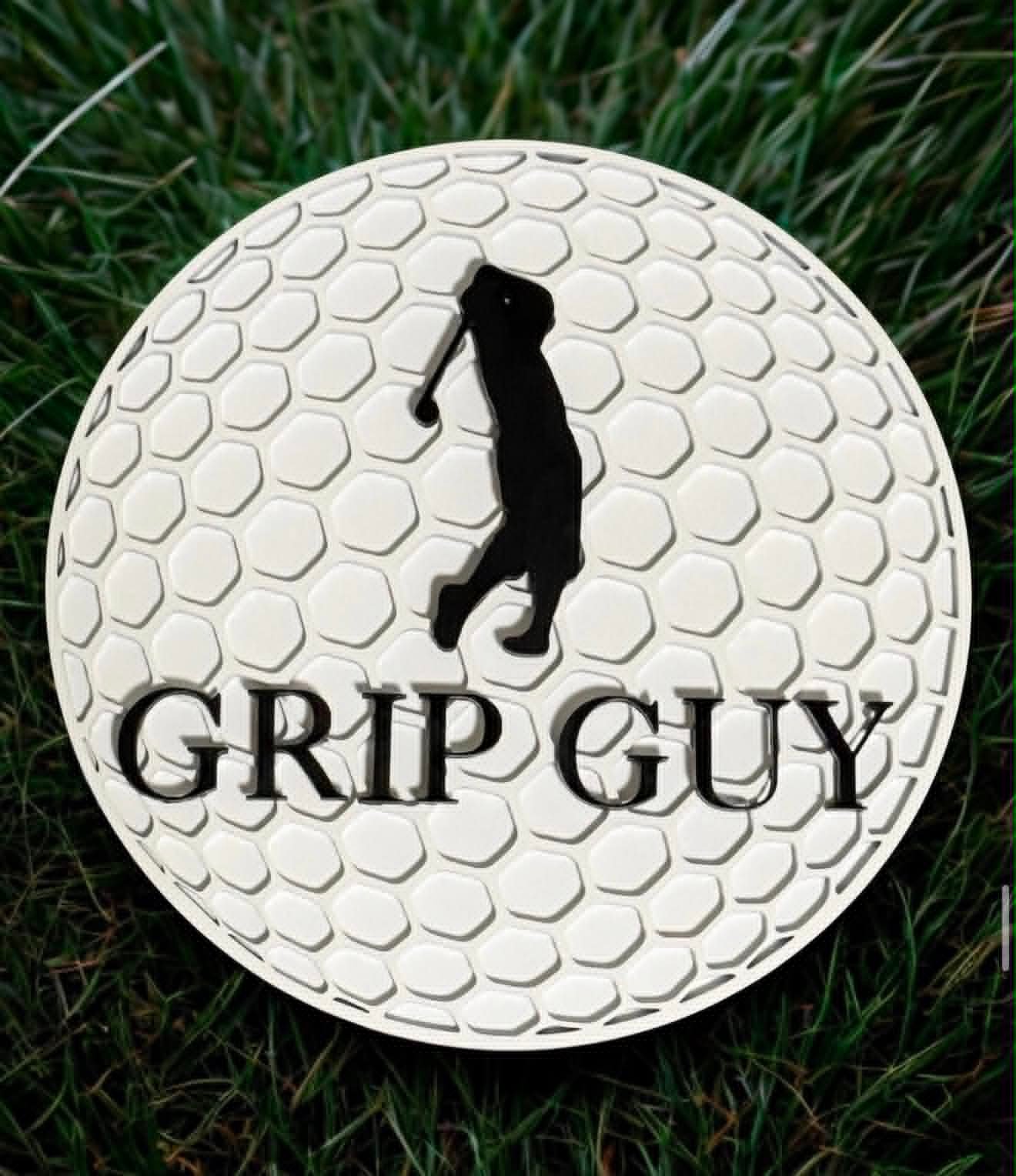 Round golf ball textured sign with a golfer silhouette reading Grip Guy